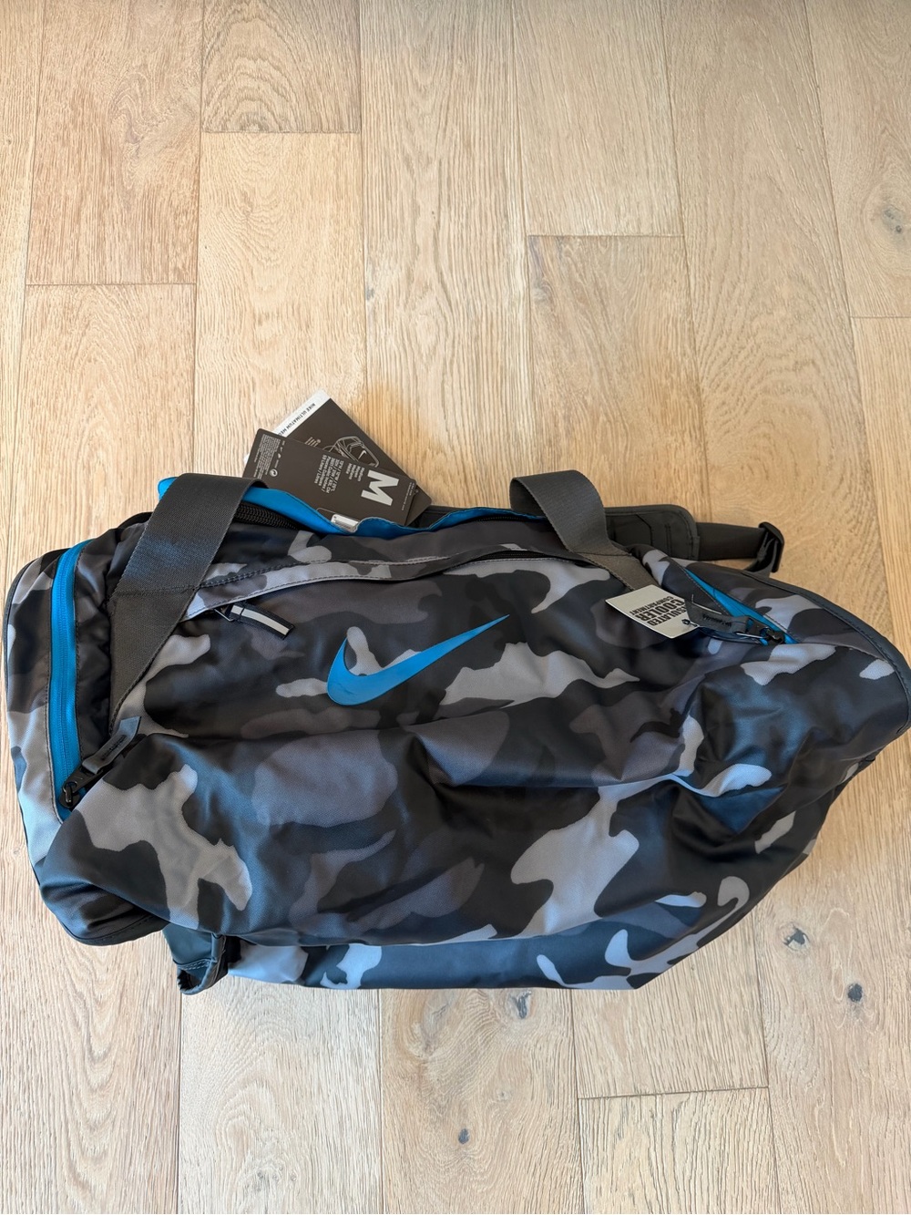 Nike Men’s Black & Gray Camo Duffel Bag with Blue Swoosh
